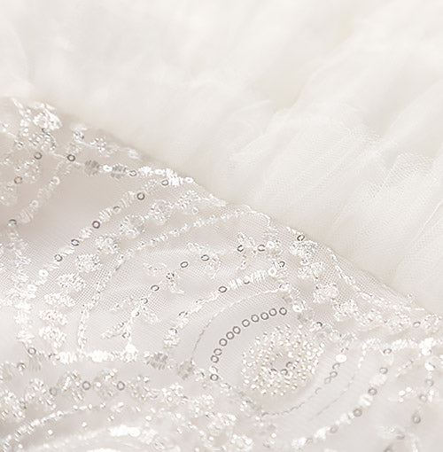 Sequin bodice and layered tulle waist detail