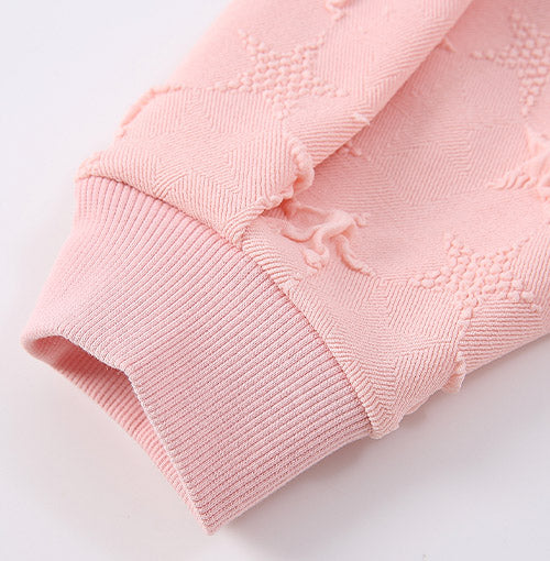 Interior finish and closure detail of the Pink Star Tulle Layered Dress