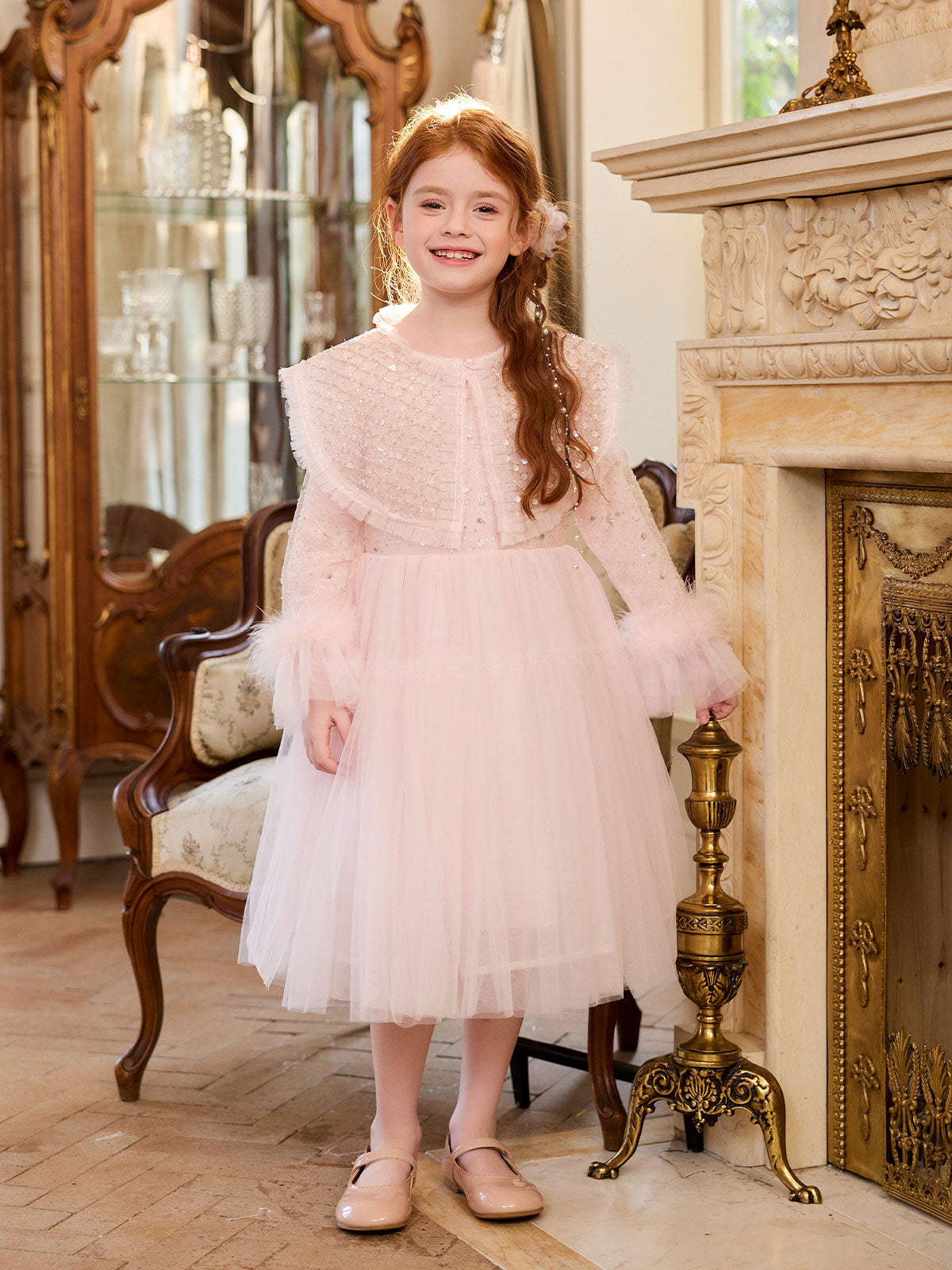 Girl wearing the Blush Sequin Cape Tulle Dress