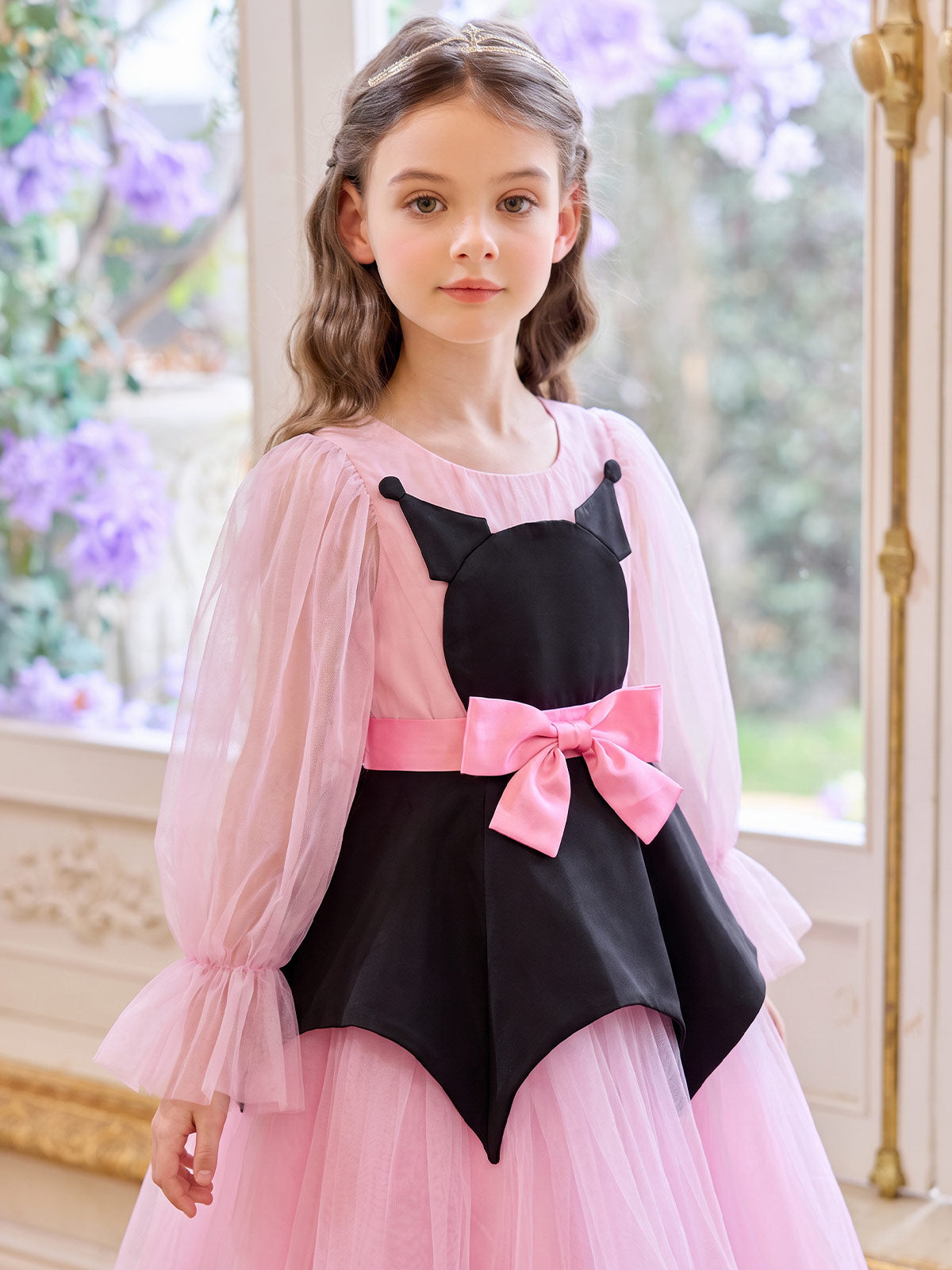Seated model view of the Pink Midnight Bow Dress