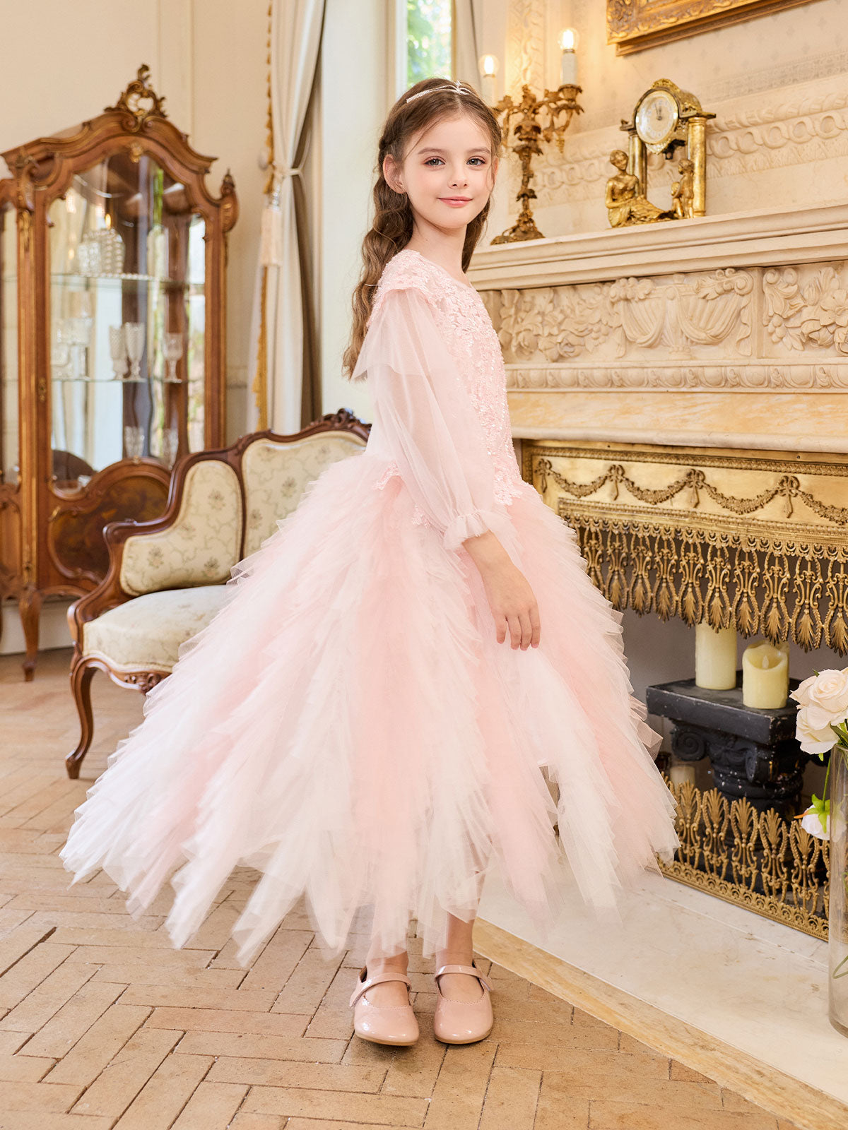 Side styling view of the Blush Beaded Cascade Tulle Gown