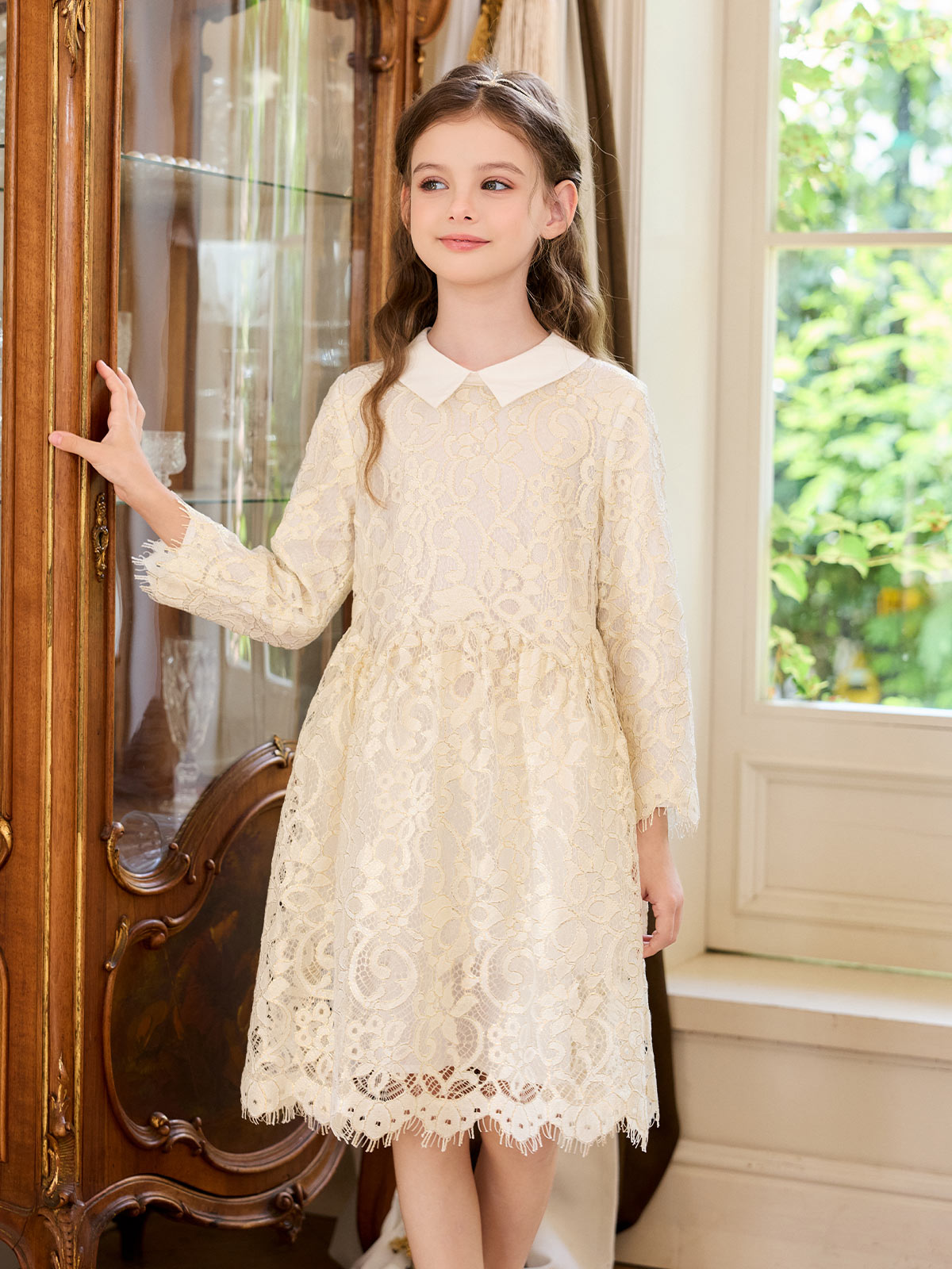 Side view of the Ivory Gilt Lace Collar Dress