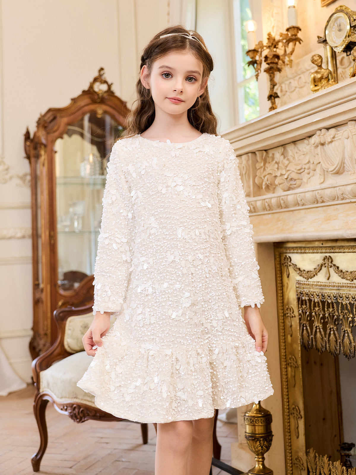 Front model view showing the flared ivory sequin hem