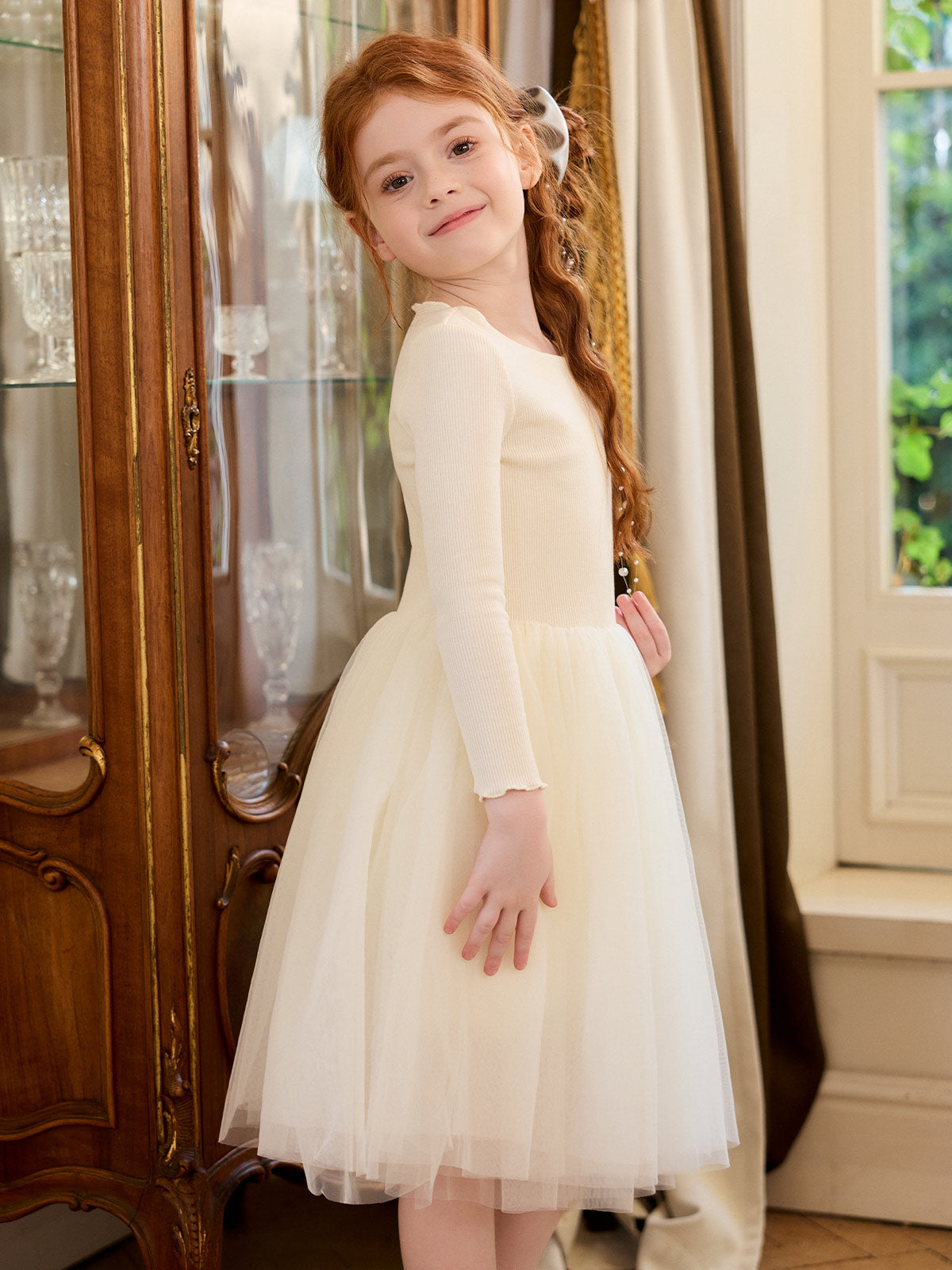 Side view of the Cream Ribbed Cotton Tulle Dress