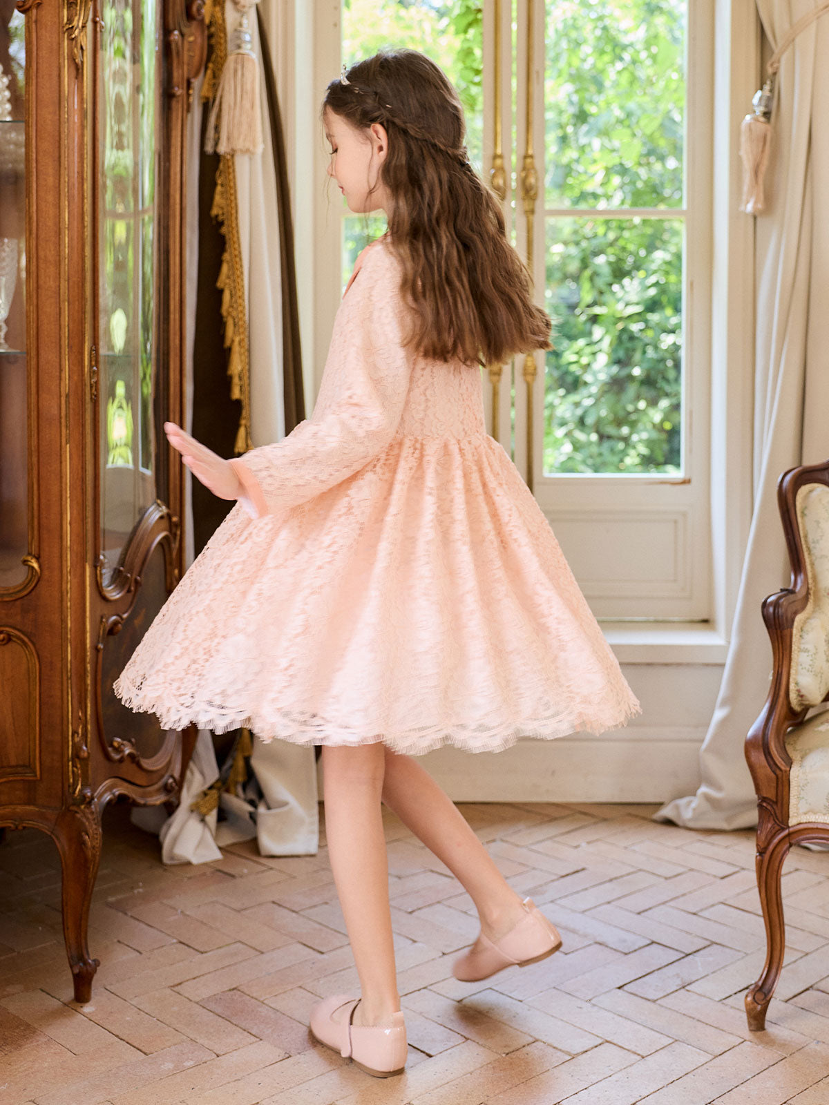 Occasion portrait featuring the Peach Petal Pearl Lace Dress