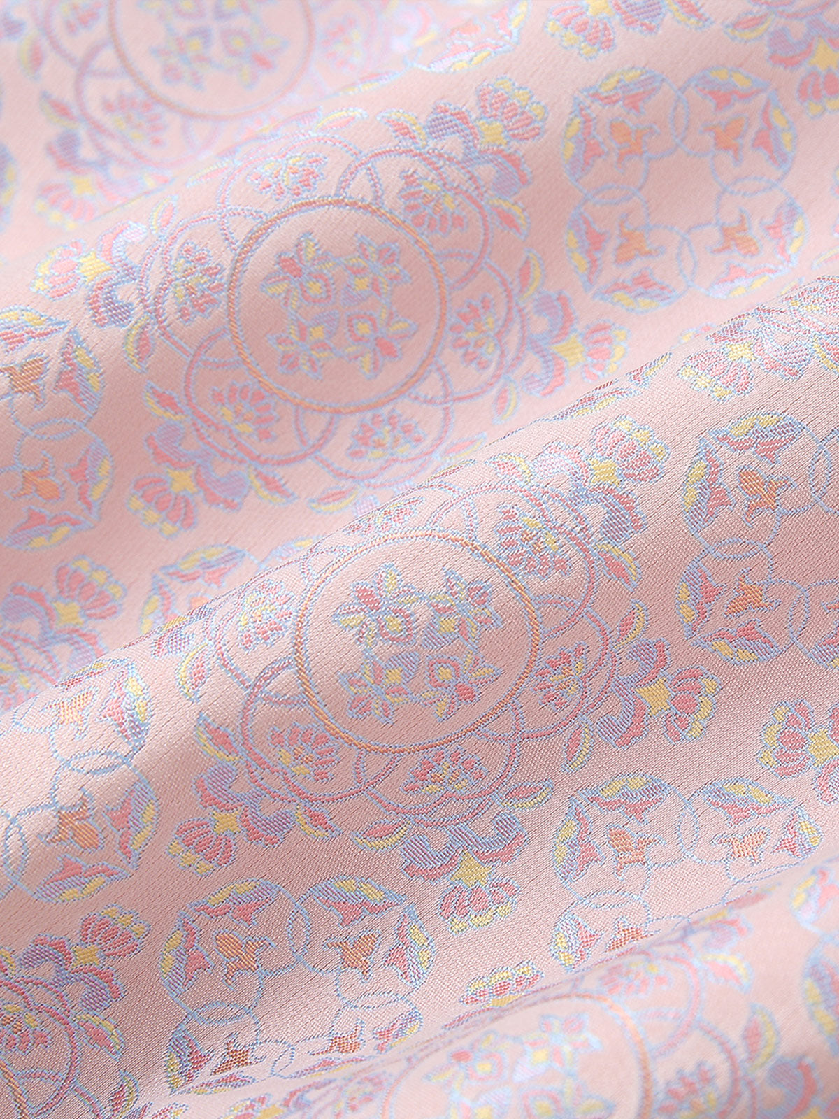 Iridescent floral brocade fabric detail