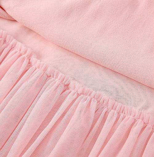 Raglan Sleeves and Rib Trims detail on the Pink Star Tulle Layered Dress