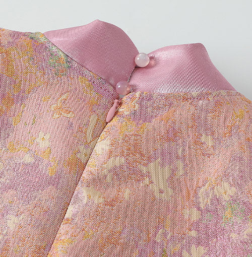 Back collar with pearl-style loop buttons