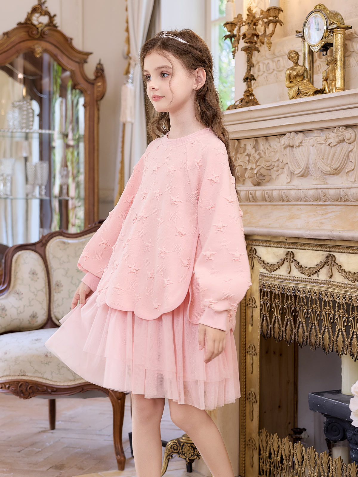 Girl wearing the Pink Star Tulle Layered Dress