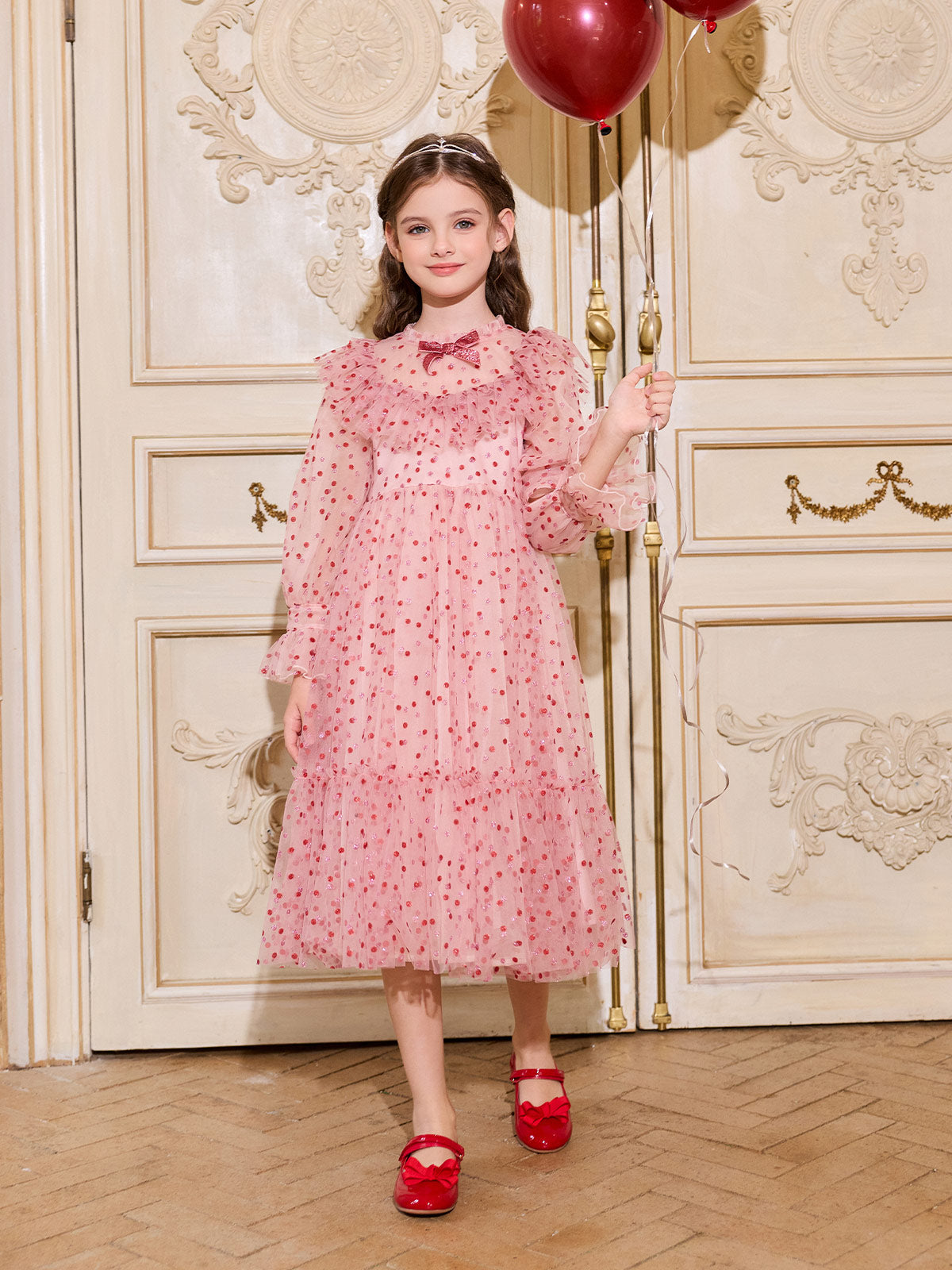 Girl wearing the Blush Ruby Sparkle Tulle Dress