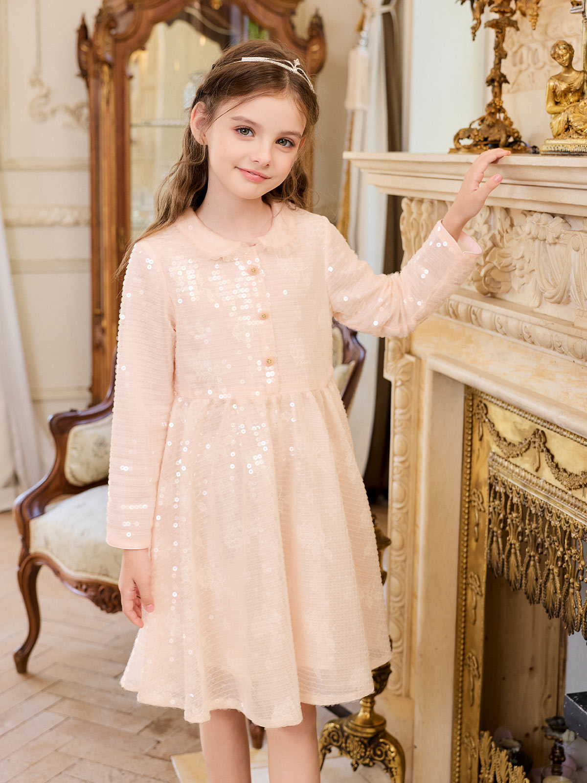 Girl wearing the Blush Rosy Spark Sequin Dress