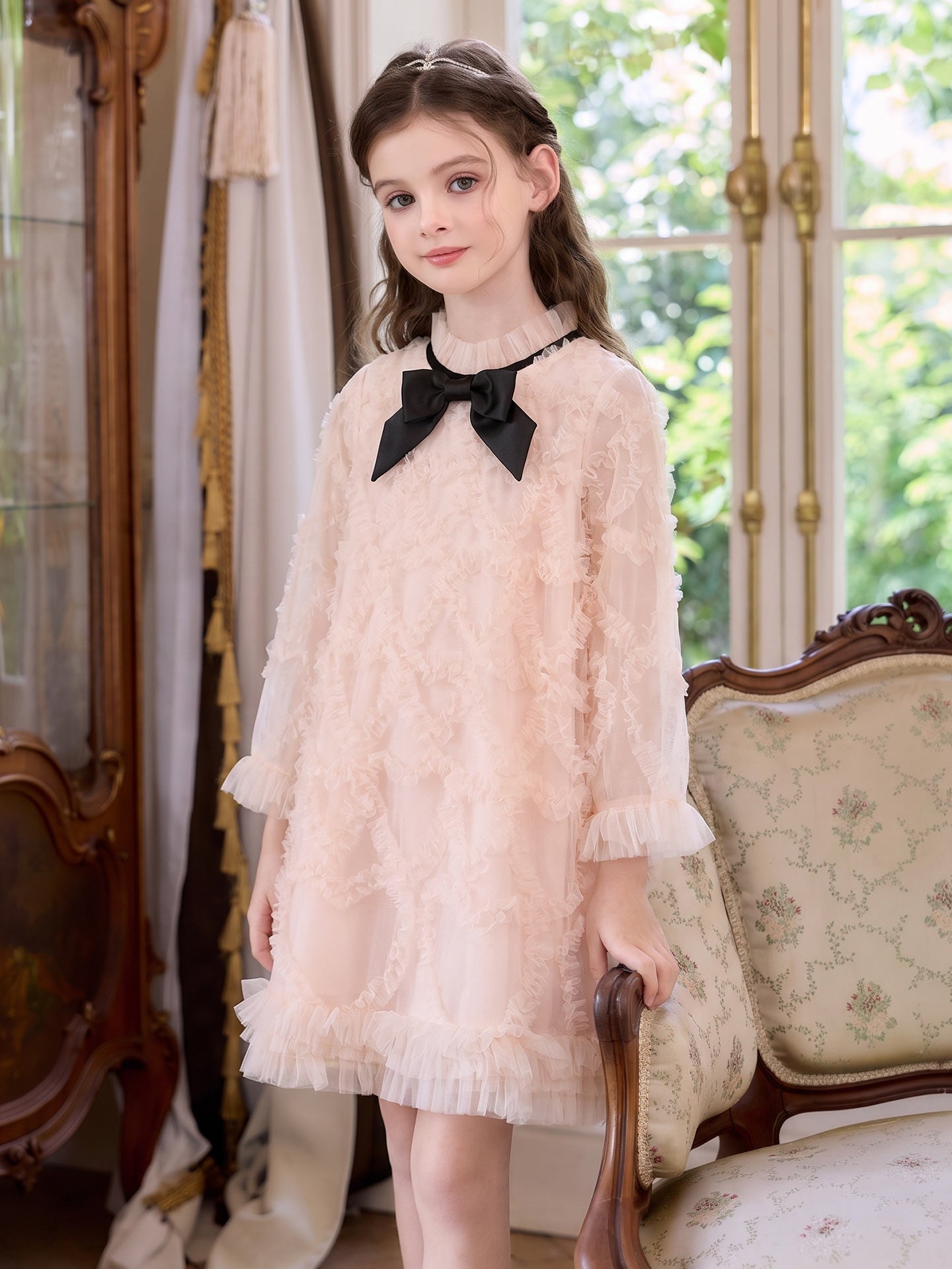 Full-length model view of the Blush Velvet Bow Tulle Dress