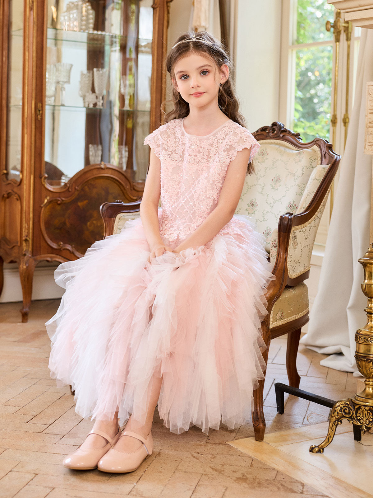 Sleeveless styling view of the Blush Beaded Cascade Tulle Gown