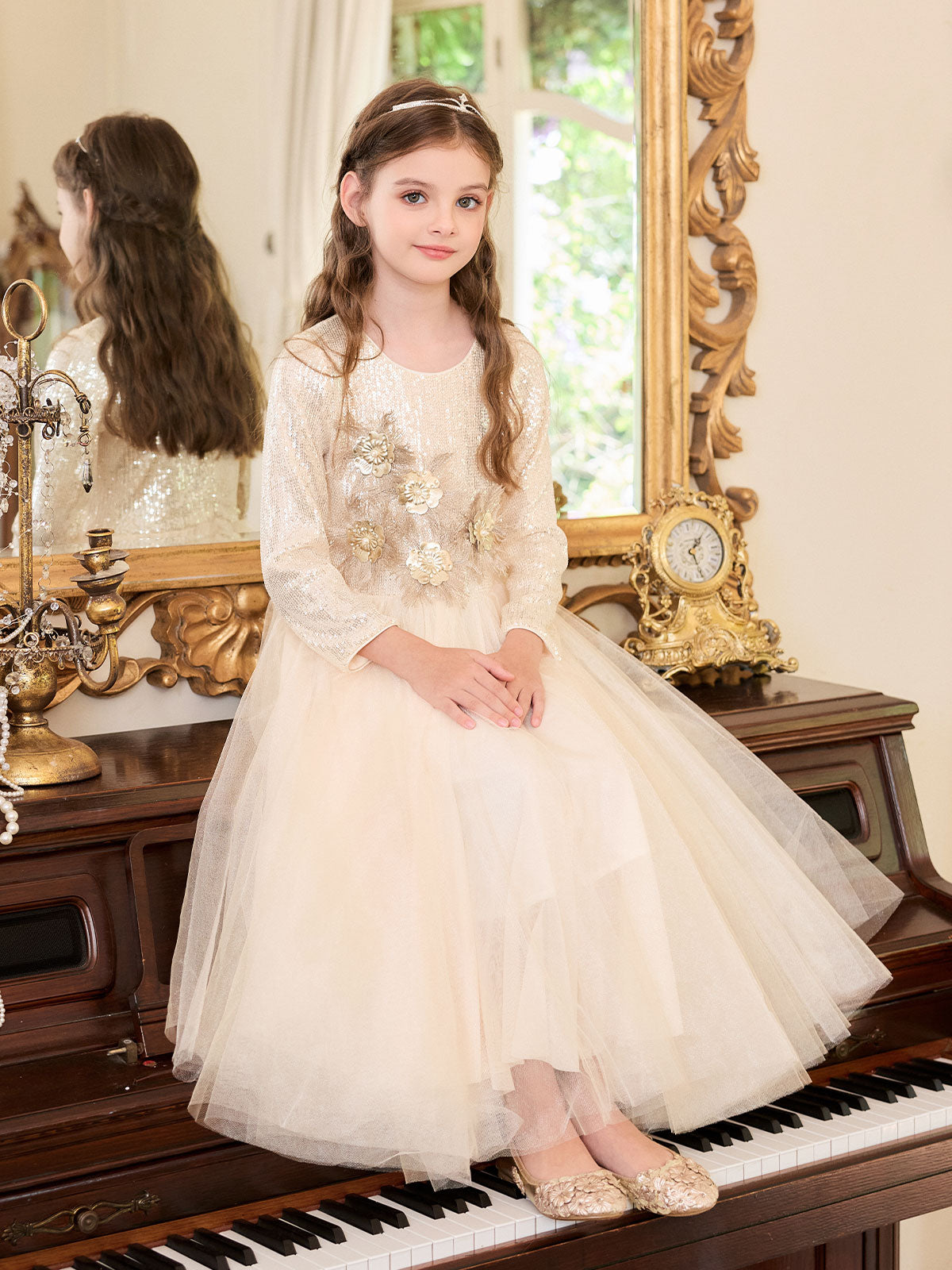 Side styling view of the Champagne Feather Bloom Tulle Dress