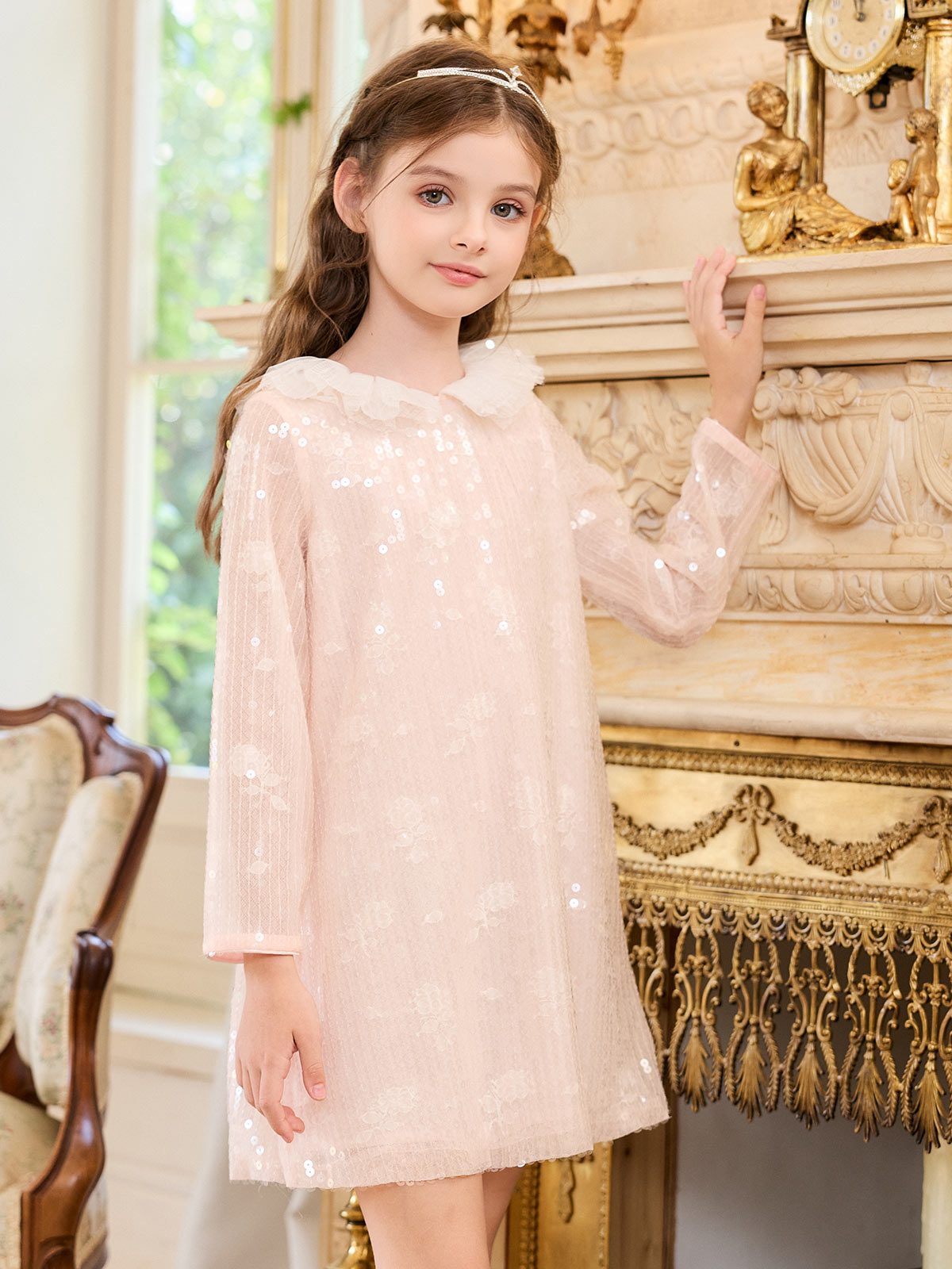 Seated model view of the Blush Lace Glow Shift Dress