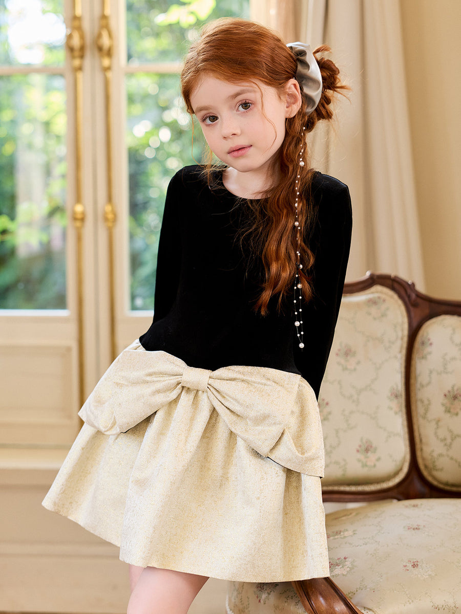 Front portrait of the Black Velvet Gold Bow Dress