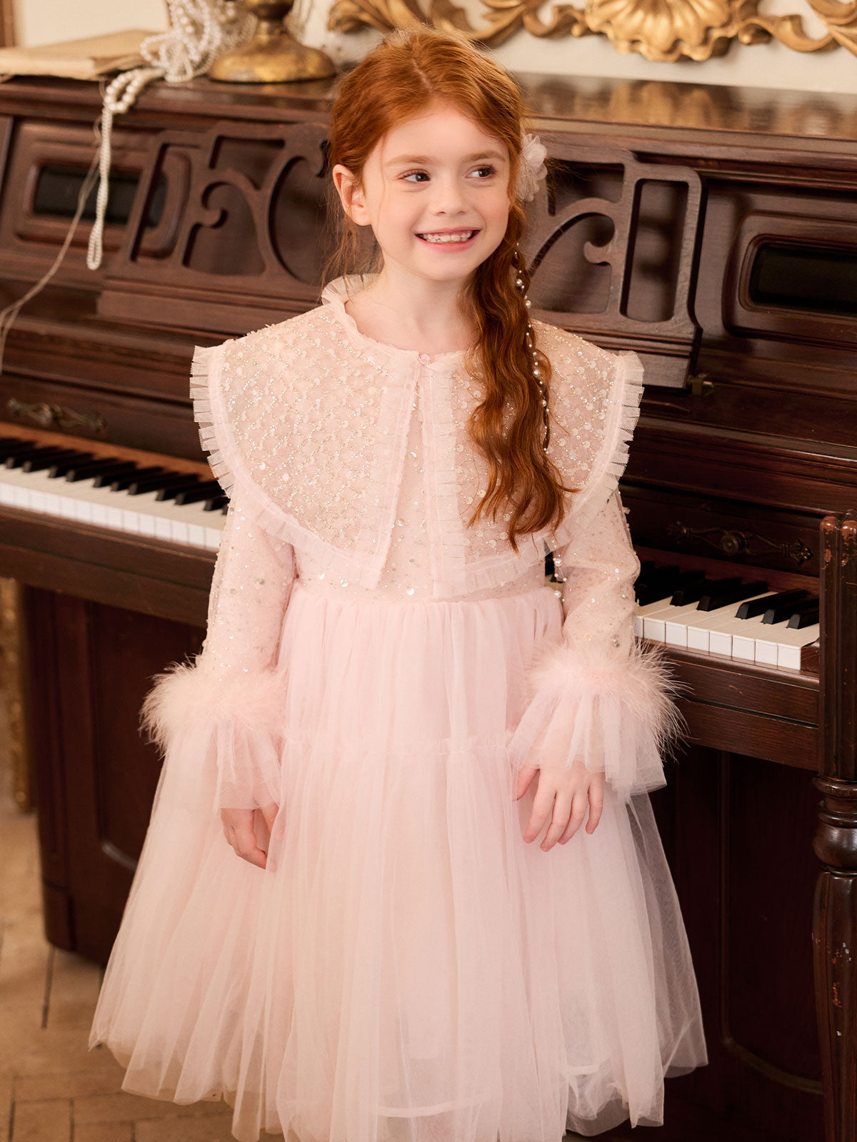 Movement view of the layered blush tulle skirt