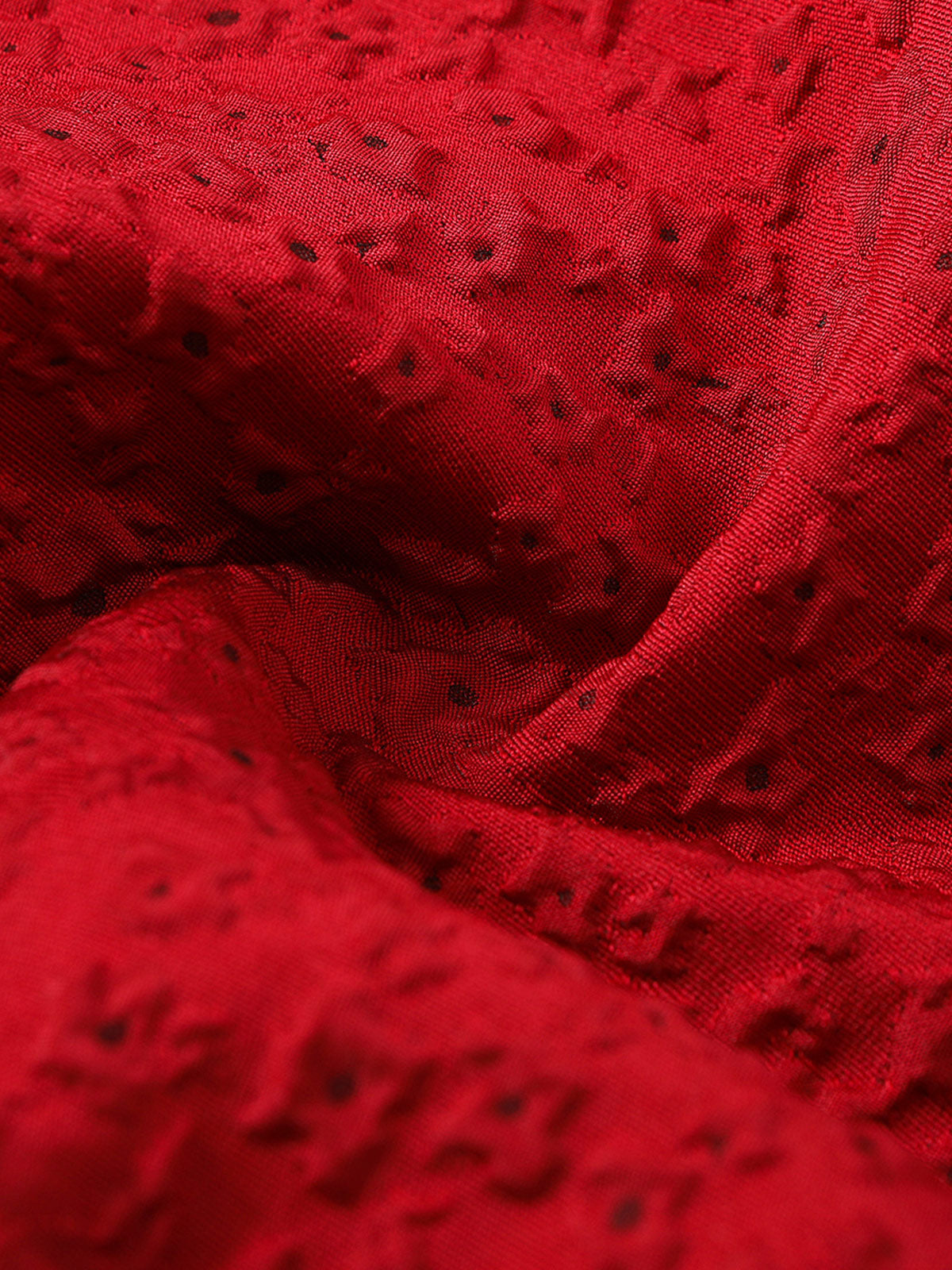 Tonal scarlet jacquard fabric detail