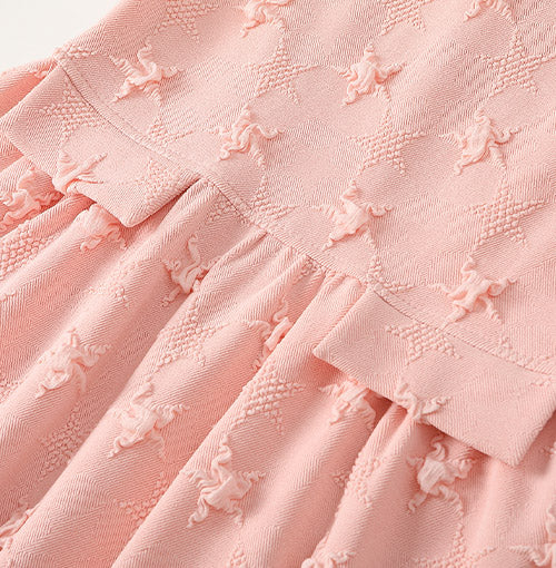 Sculpted High-Waist Tabs detail on the Blush Star Jacquard Dress