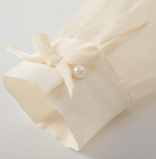 Sheer Balloon Sleeves detail on the Ivory Fringe Glow Dress