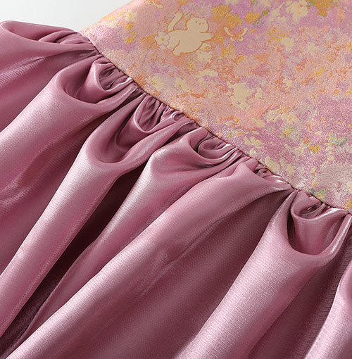 Gathered lavender satin skirt detail
