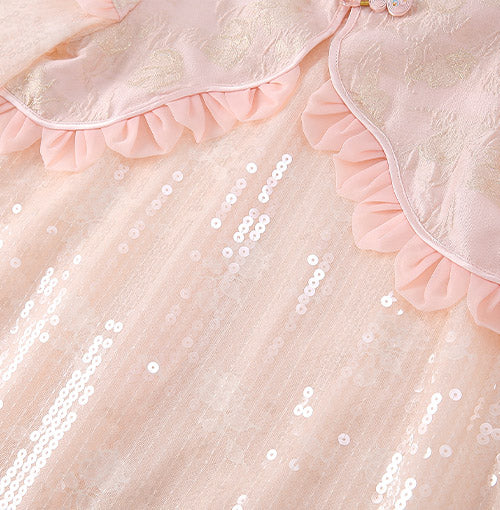 Petal-trimmed jacquard cape detail