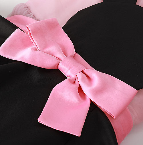 Sculpted Pointed Peplum detail on the Pink Midnight Bow Dress